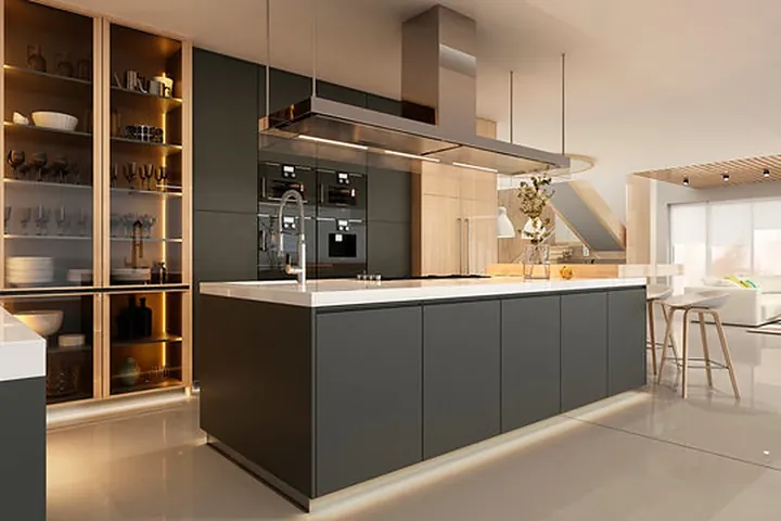 Kitchen with lit glass display cabinets and pendant lighting